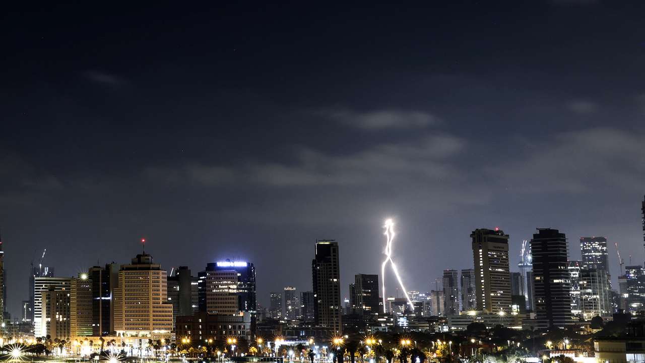 An interceptor flies in the sky as missiles from Iran are fired to Israel, as seen from Tel Aviv