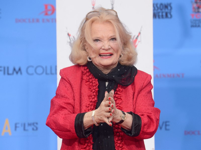 FILE PHOTO: Rowlands poses for photographers at a ceremony where the actress places hand and footprints in the forecourt of the TCL Chinese Theatre in Los Angeles
