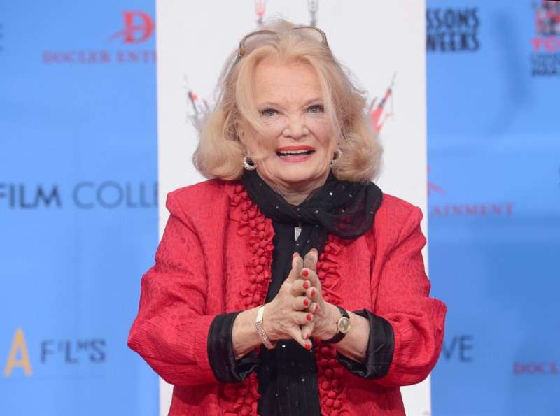 FILE PHOTO: Rowlands poses for photographers at a ceremony where the actress places hand and footprints in the forecourt of the TCL Chinese Theatre in Los Angeles