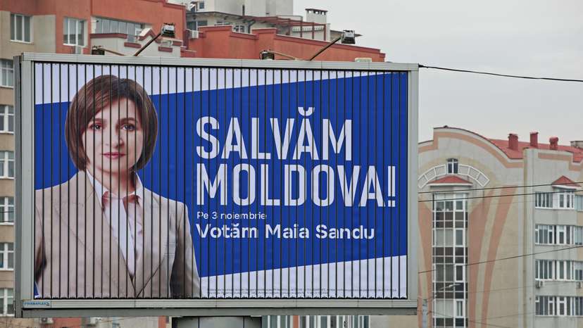 A view shows an election banner of Moldova's incumbent President and presidential candidate Maia Sandu in Chisinau