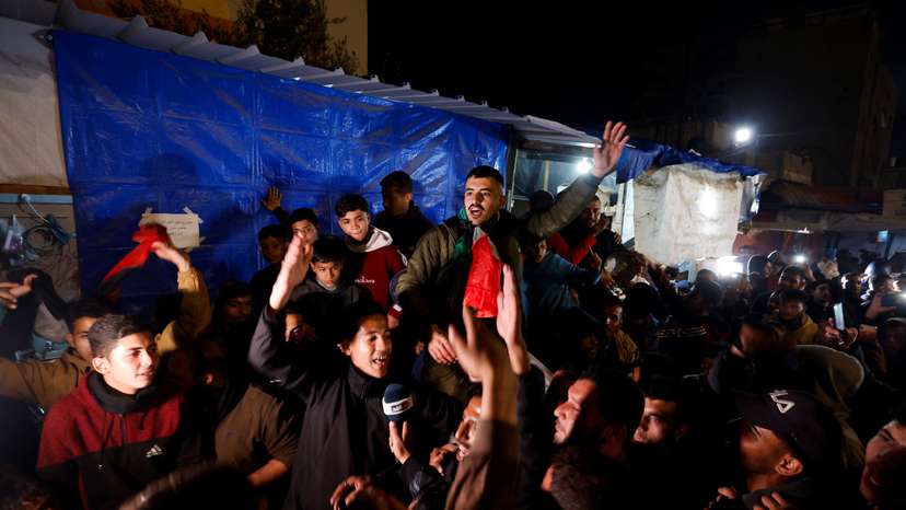 Palestinians react to news on a ceasefire deal with Israel, in Khan Younis in the southern Gaza Strip