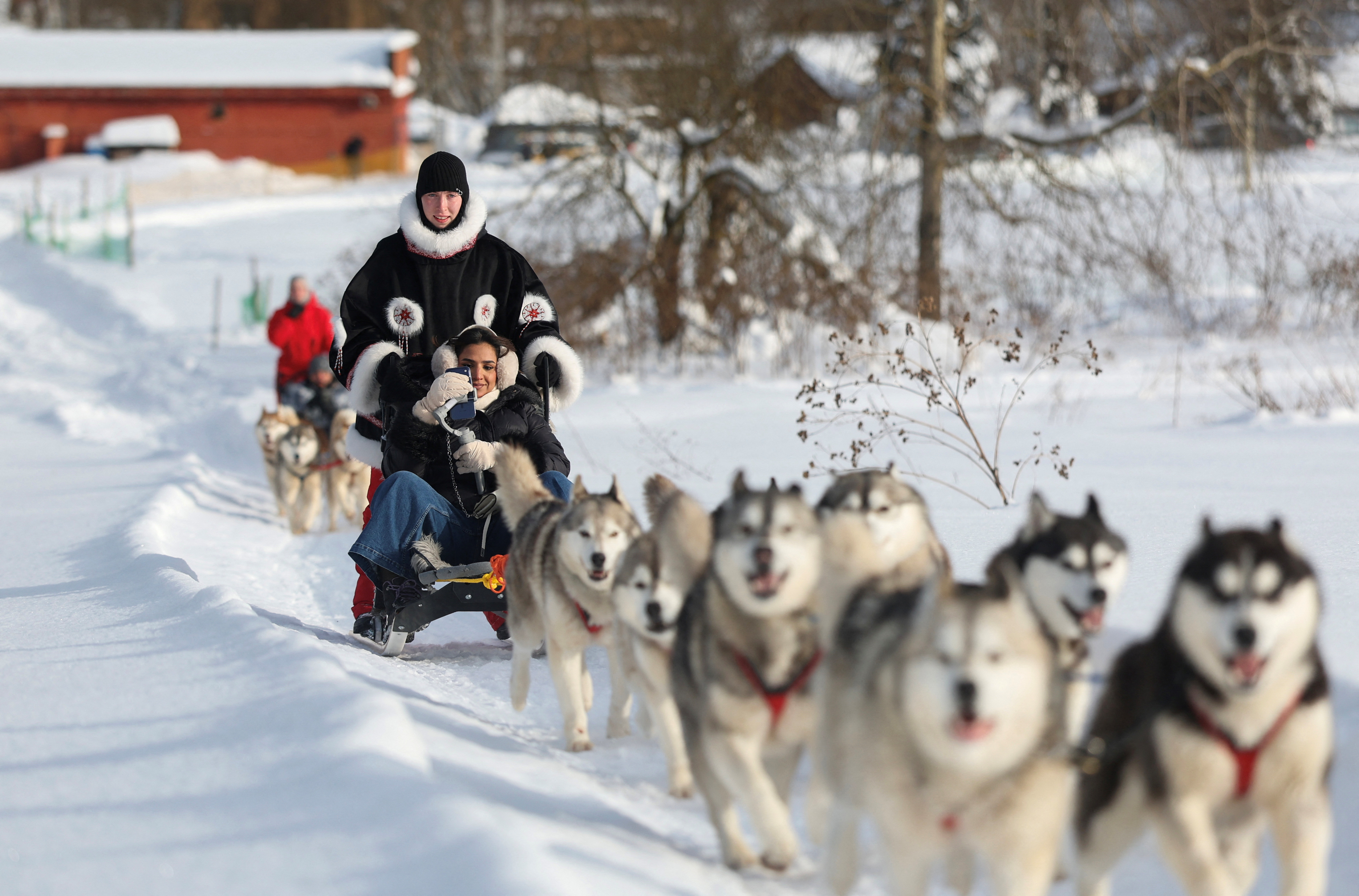 A tourist from Oman visits Husky Land Park in the Moscow region