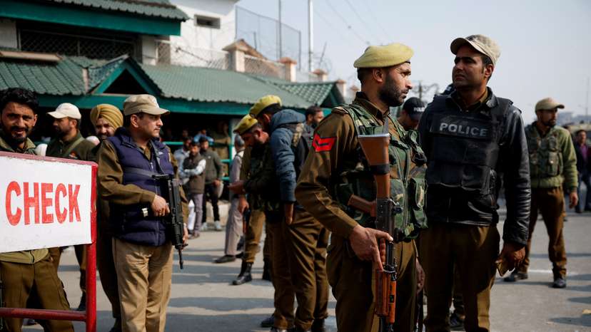 Indian security personnel stand guard outside the Jammu and Kashmir Assembly as it holds the first session amid a series of militant attacks in Srinagar