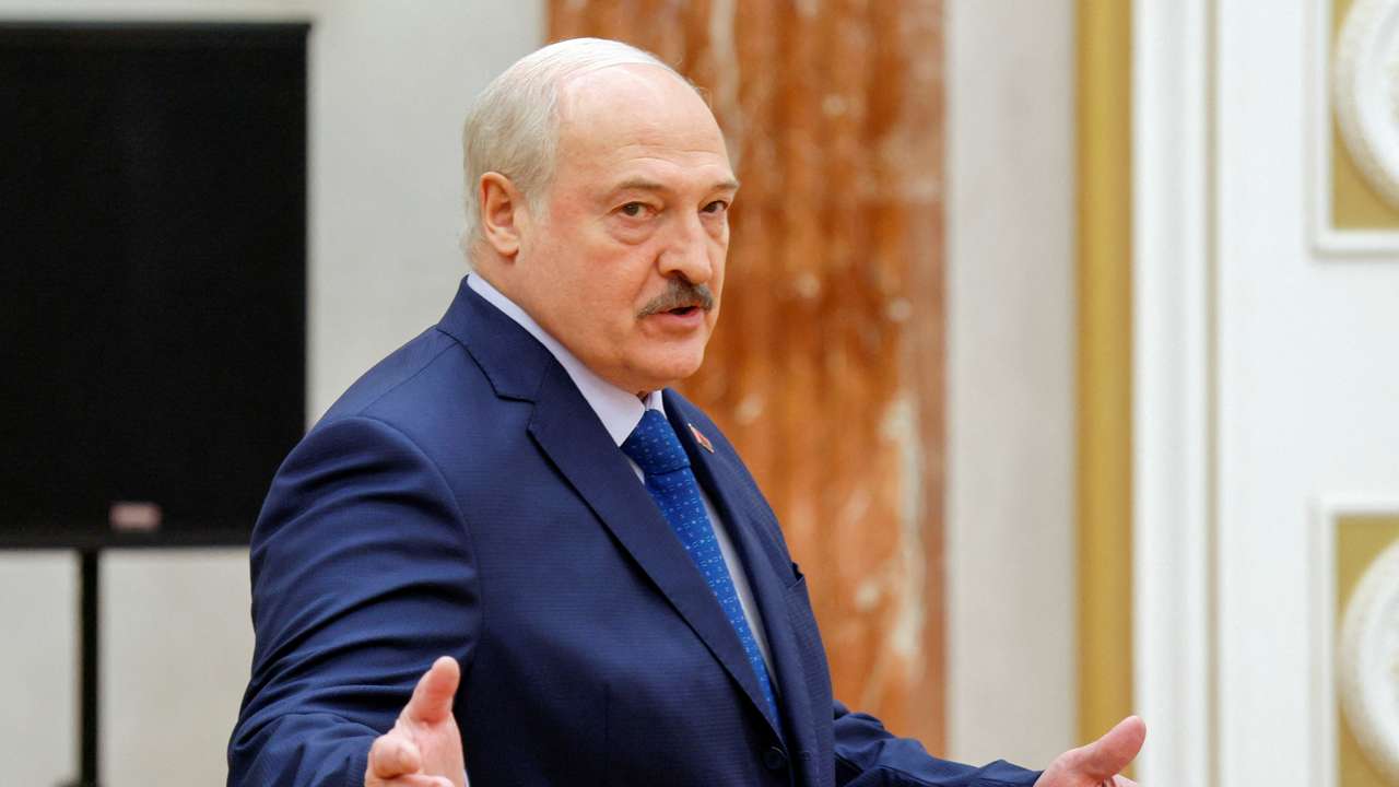 Belarusian President Alexander Lukashenko gestures before a press conference in Minsk