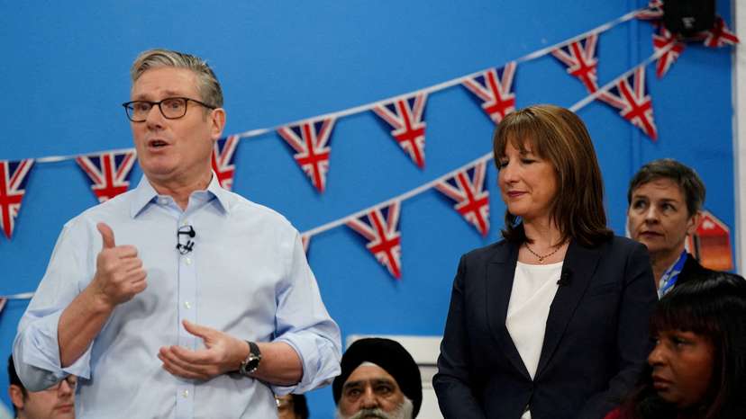 FILE PHOTO: Britain's Chancellor of the Exchequer Rachel Reeves stands next to Prime Minister Keir Starmer