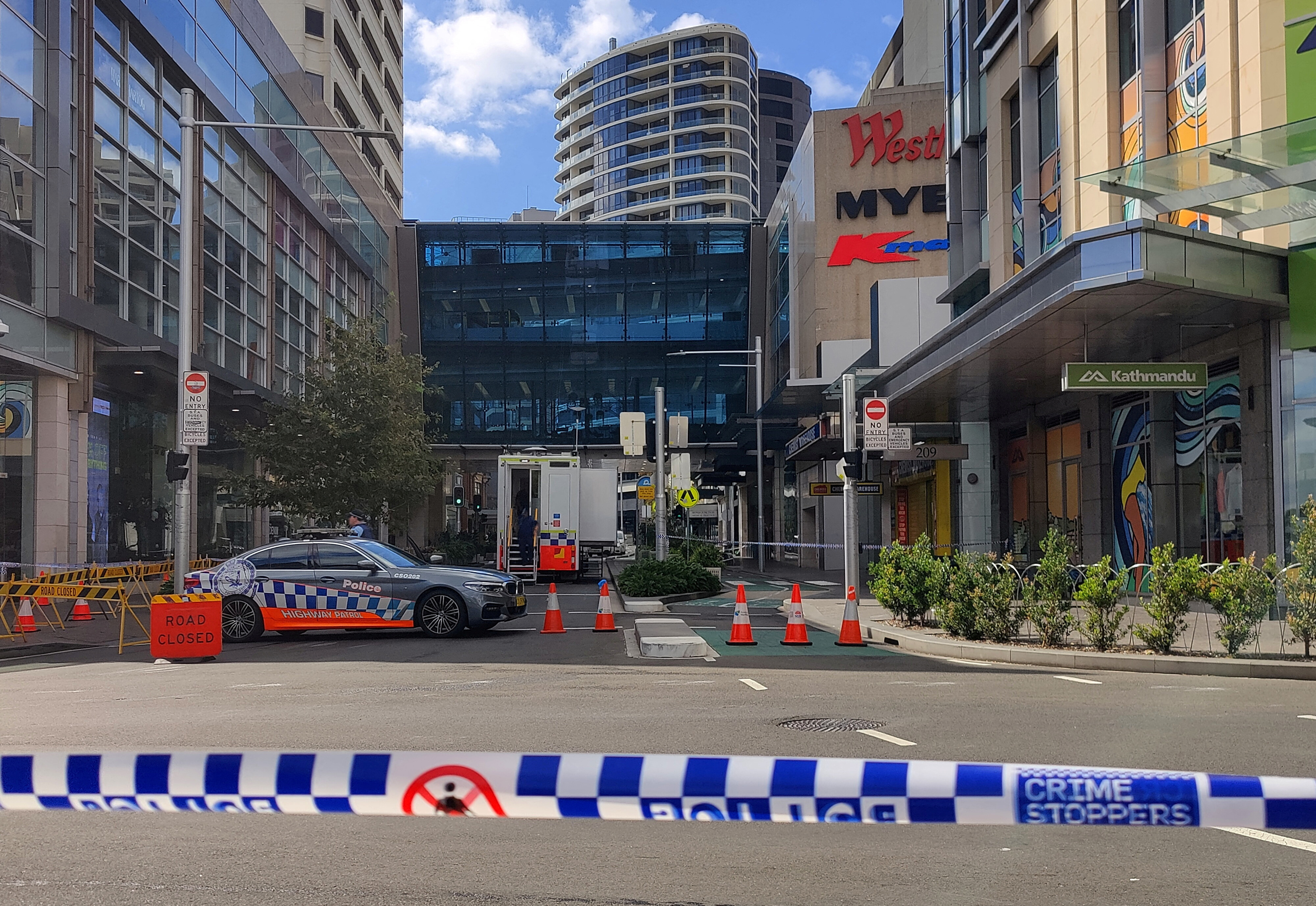 FILE PHOTO: A view of a police car outside Westfield Bondi Junction as the mall remains under lockdown following Saturday’s stabbings in Sydney