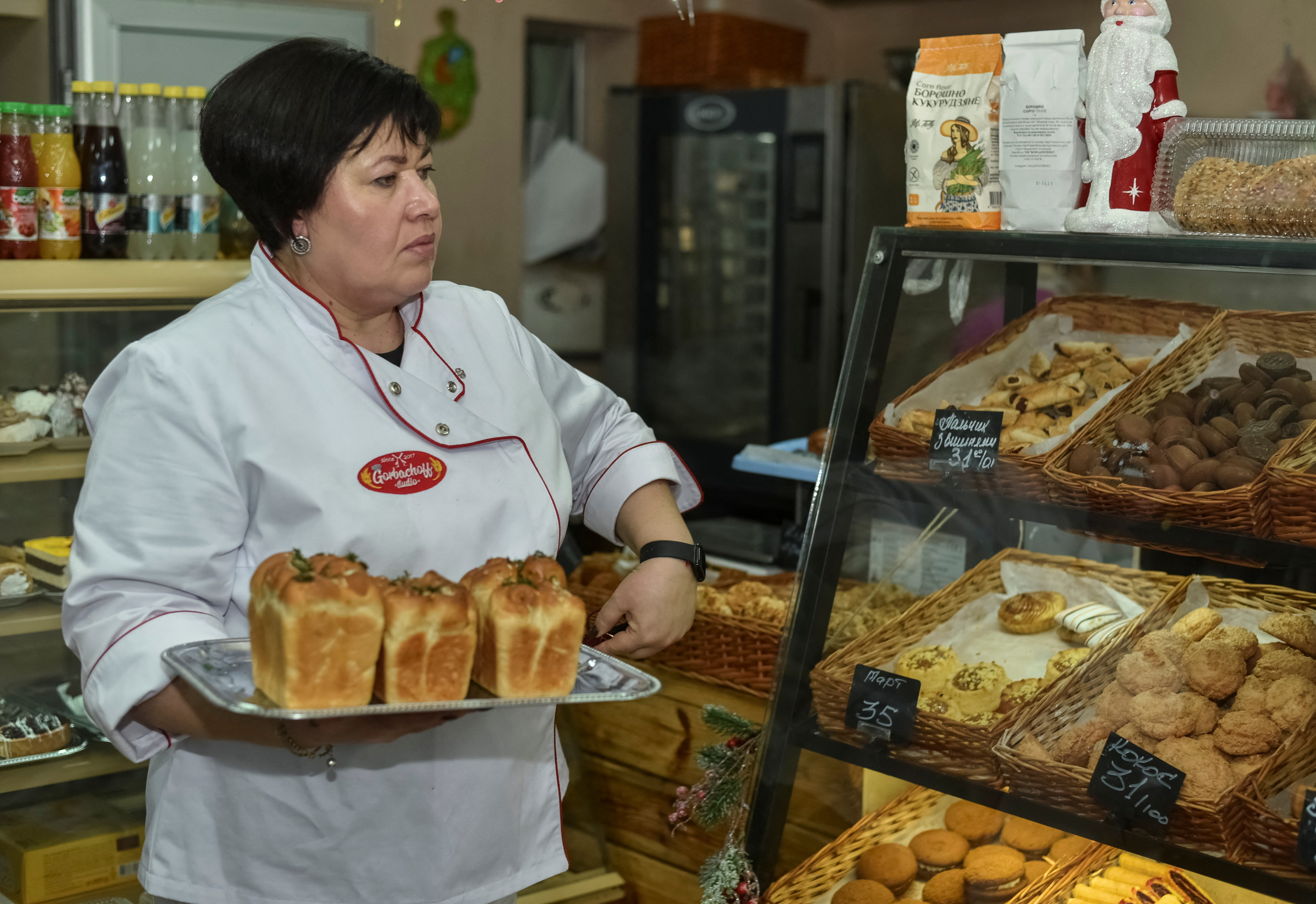 Hanna Horbachova works inside her bakery in Dnipro