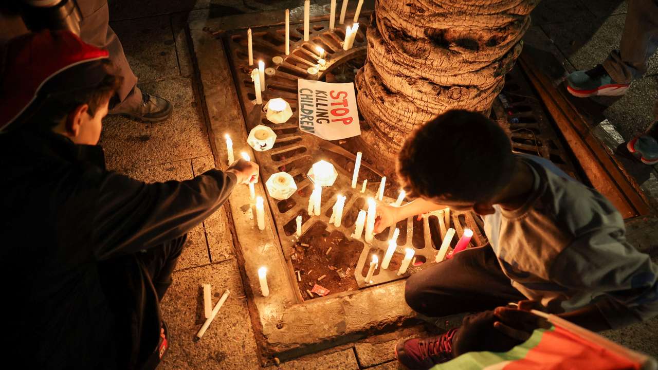 People take part in a candlelight vigil in support of Palestinians in Gaza, in Beirut