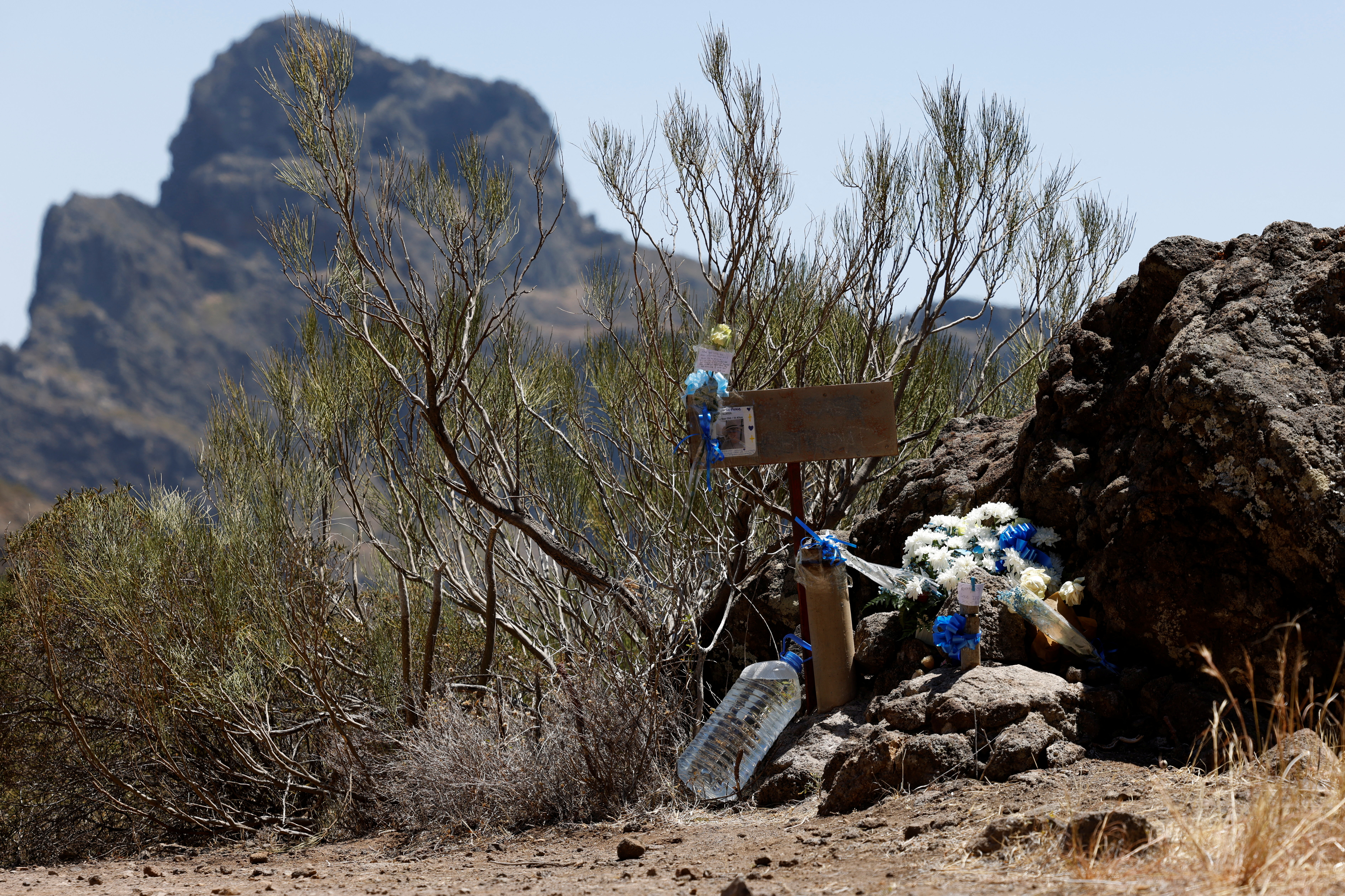 Flowers left by family of British teenager Jay Slater, in Masca