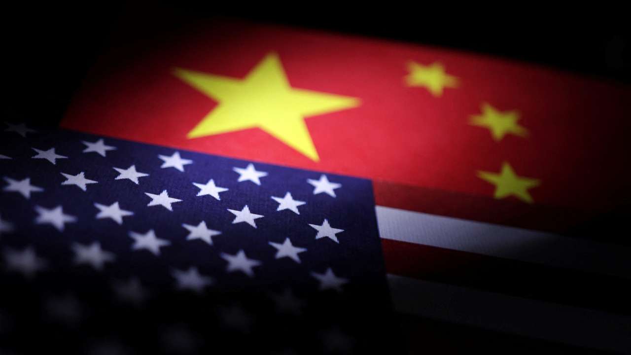 Illustration shows U.S. and Chinese flags