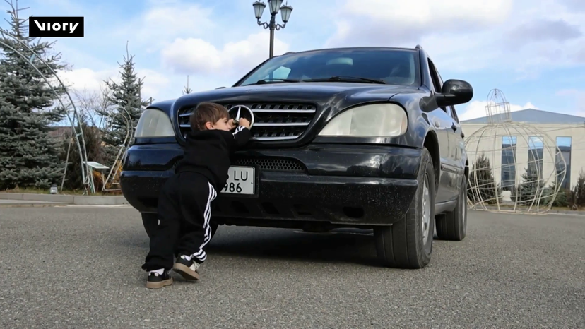 Two-year-old Armenian boy PUSHES CAR after breaking strength record as a six-month-old