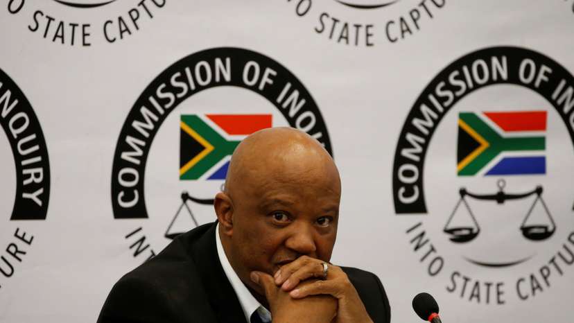 Former Deputy Finance Minister Mcebisi Jonas gestures ahead of the Judicial Commission of Inquiry probing state capture in Johannesburg