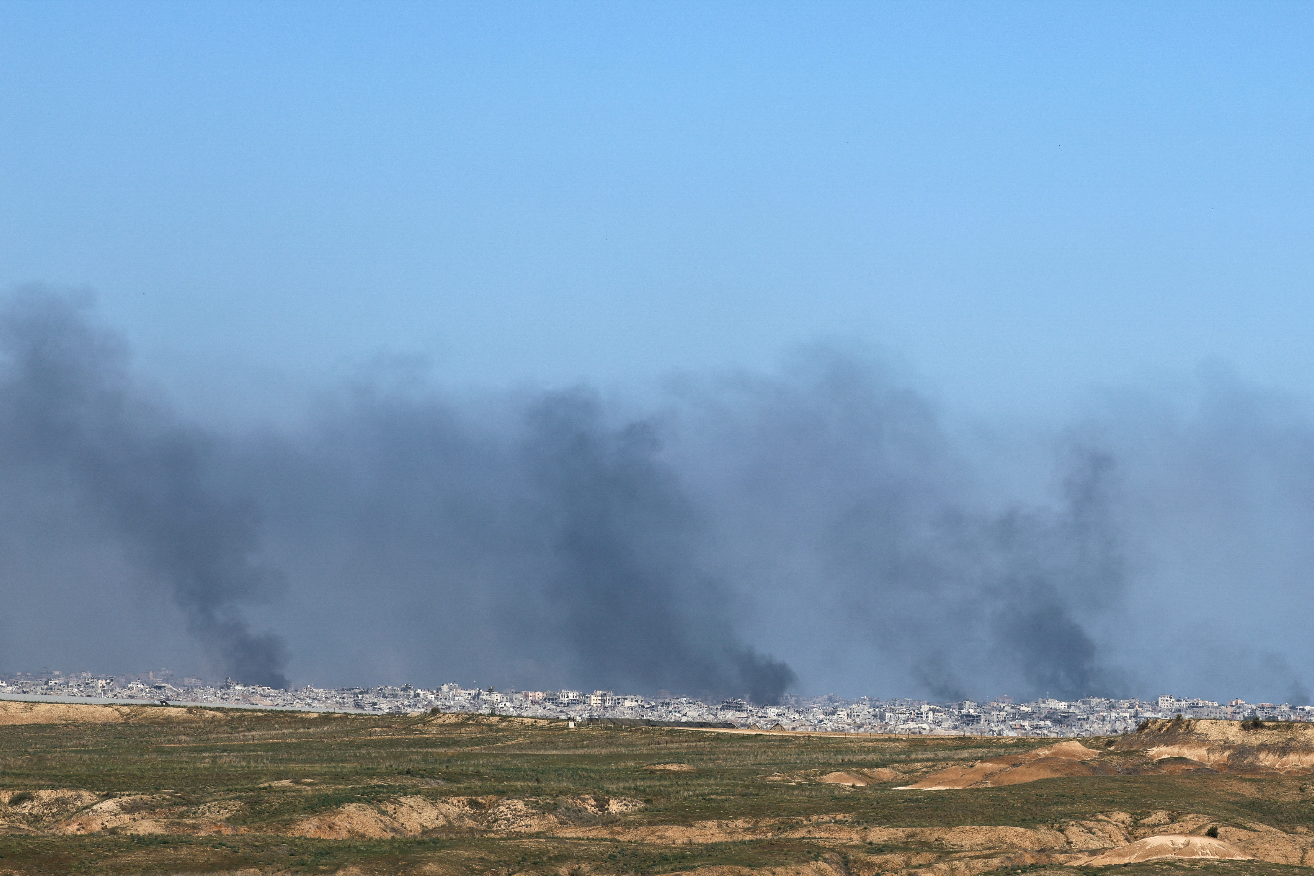 Smoke rises over Gaza, as seen from southern Israel
