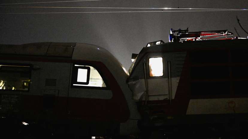 First responders attend the scene of a collision between two trains in the town of Pezinok