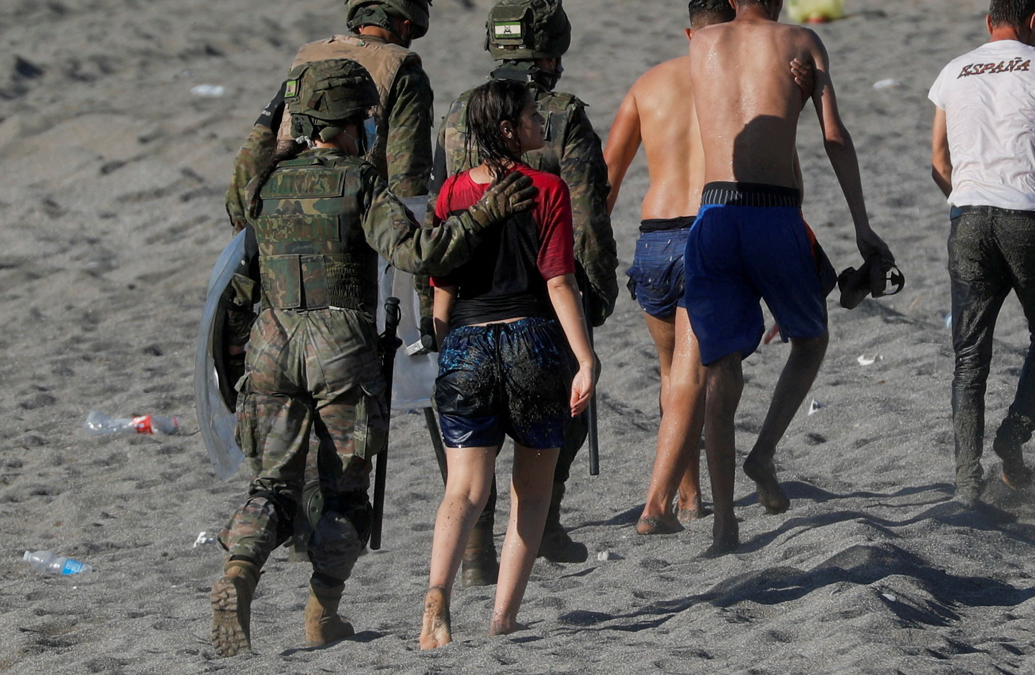 FILE PHOTO: Thousands of migrants cross the Spanish-Moroccan border