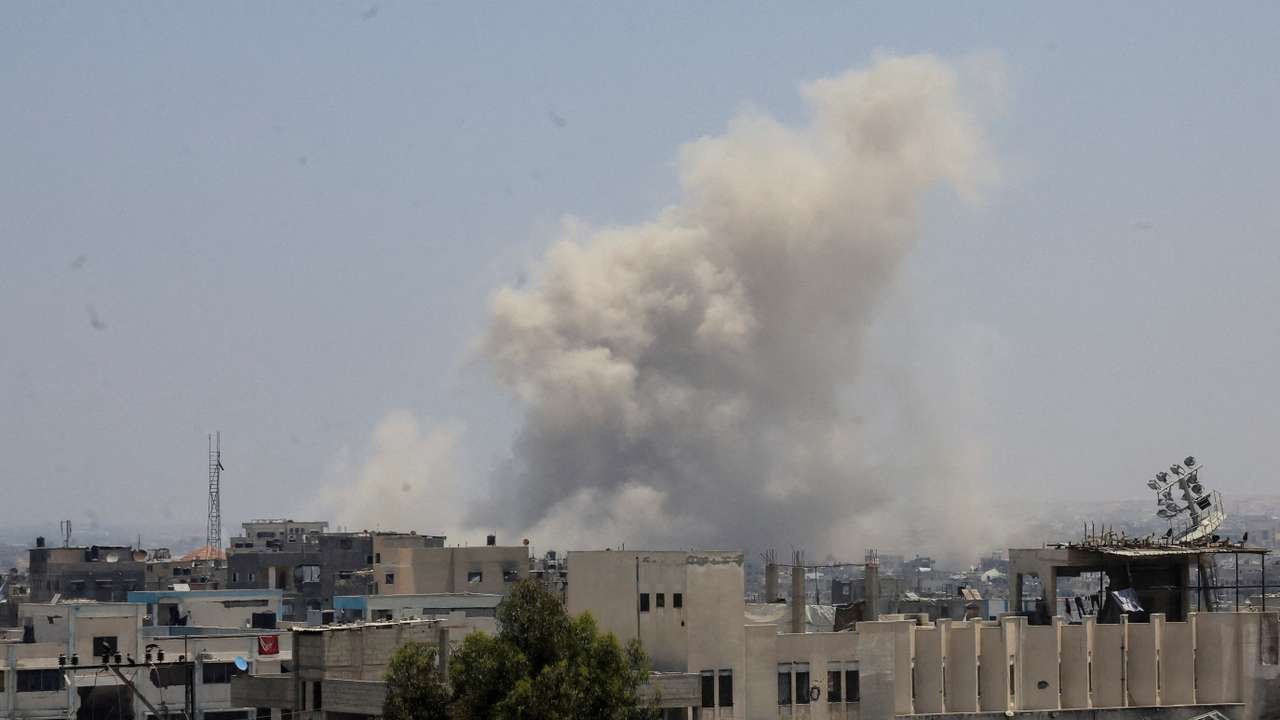 Smoke rises following Israeli strikes, in Khan Younis