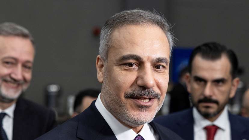 FILE PHOTO: Turkish Foreign Minister Hakan Fidan chats with press members ahead of the NATO Foreign Ministers Meeting in Antalya
