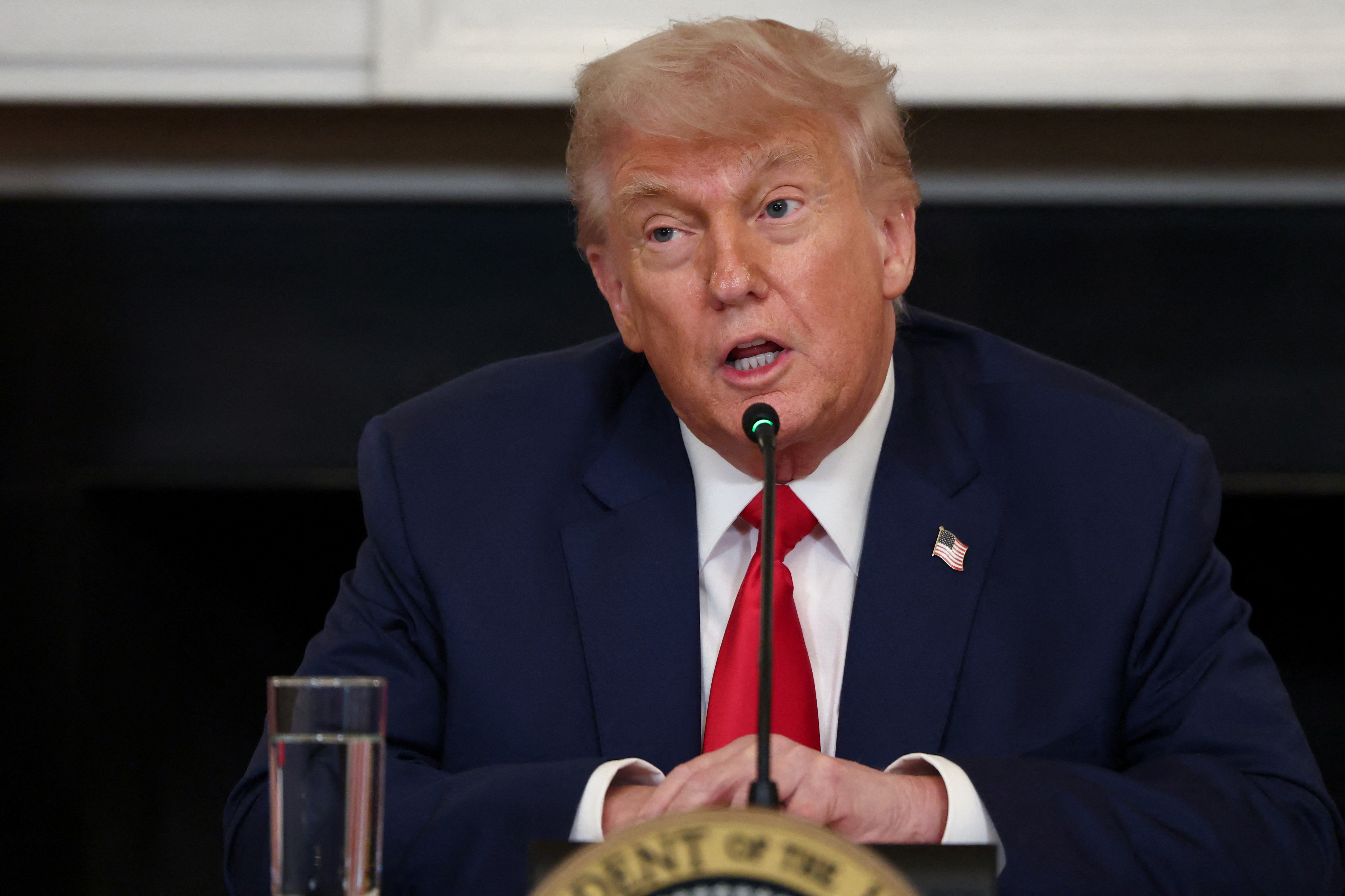 U.S. President Donald Trump participates in an Invest America Roundtable, at the White House, in Washington