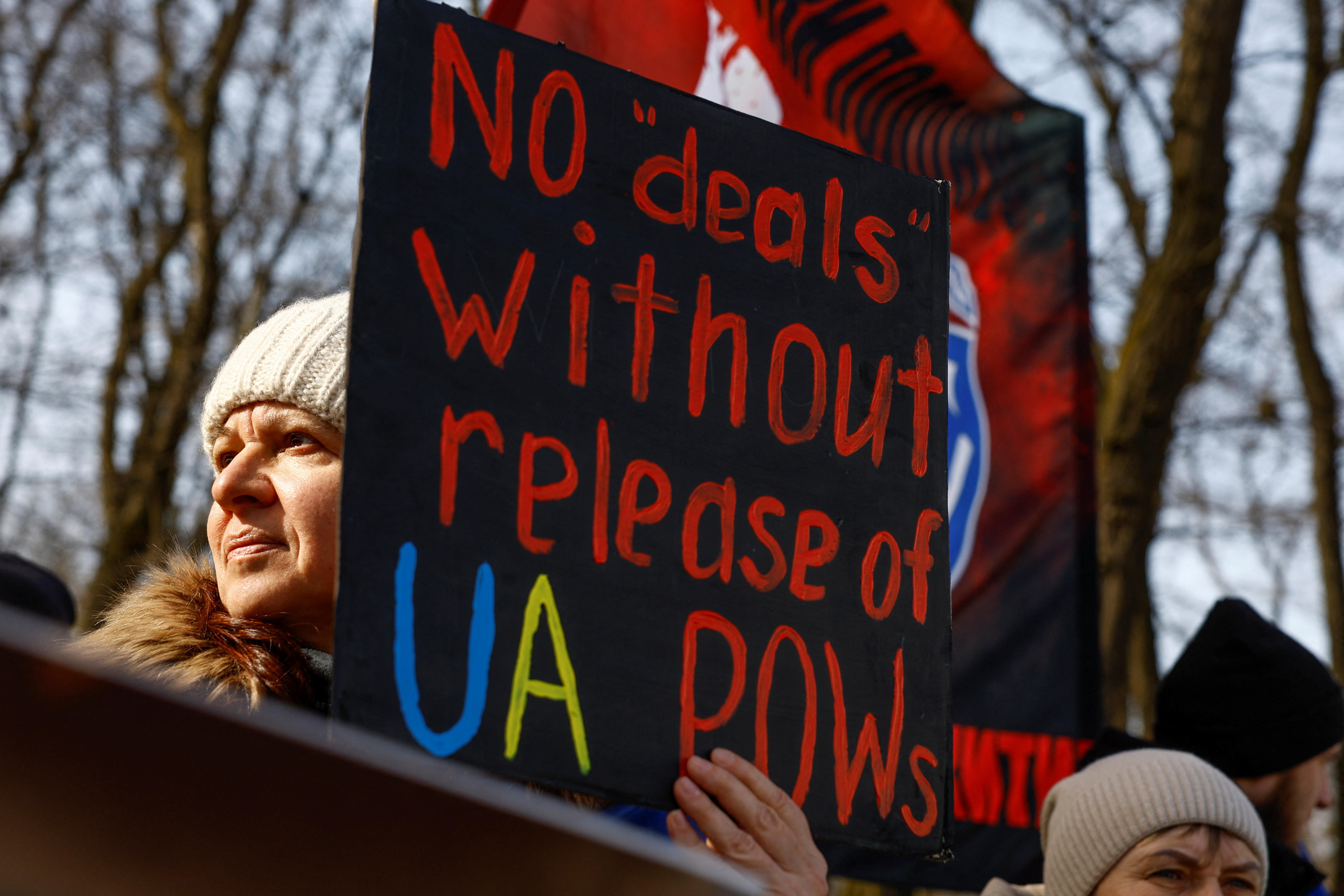 Relatives of Ukrainian POWs hold a rally outside the U.S. embassy in Kyiv