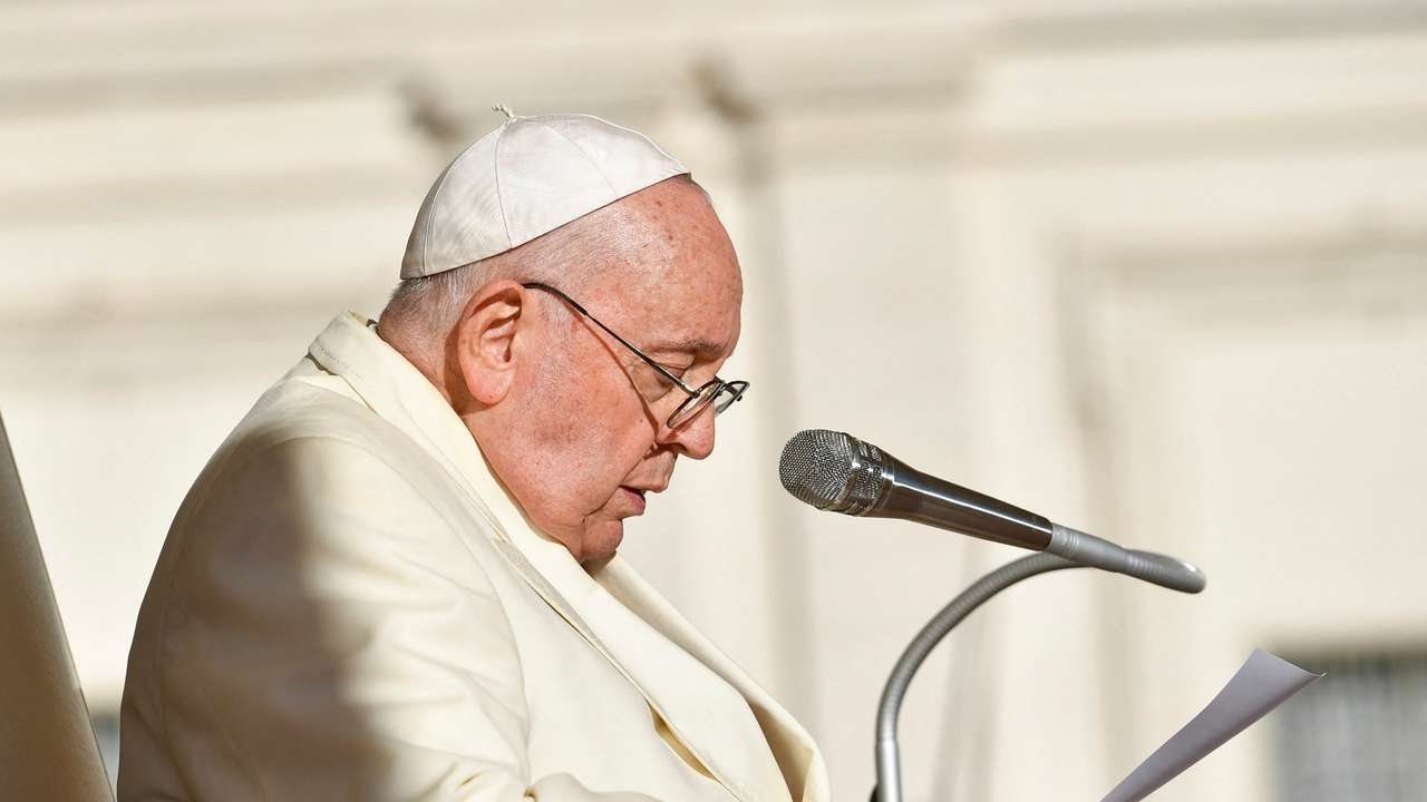 FILE PHOTO: Pope Francis meets people on the day of a weekly audience at the Vatican
