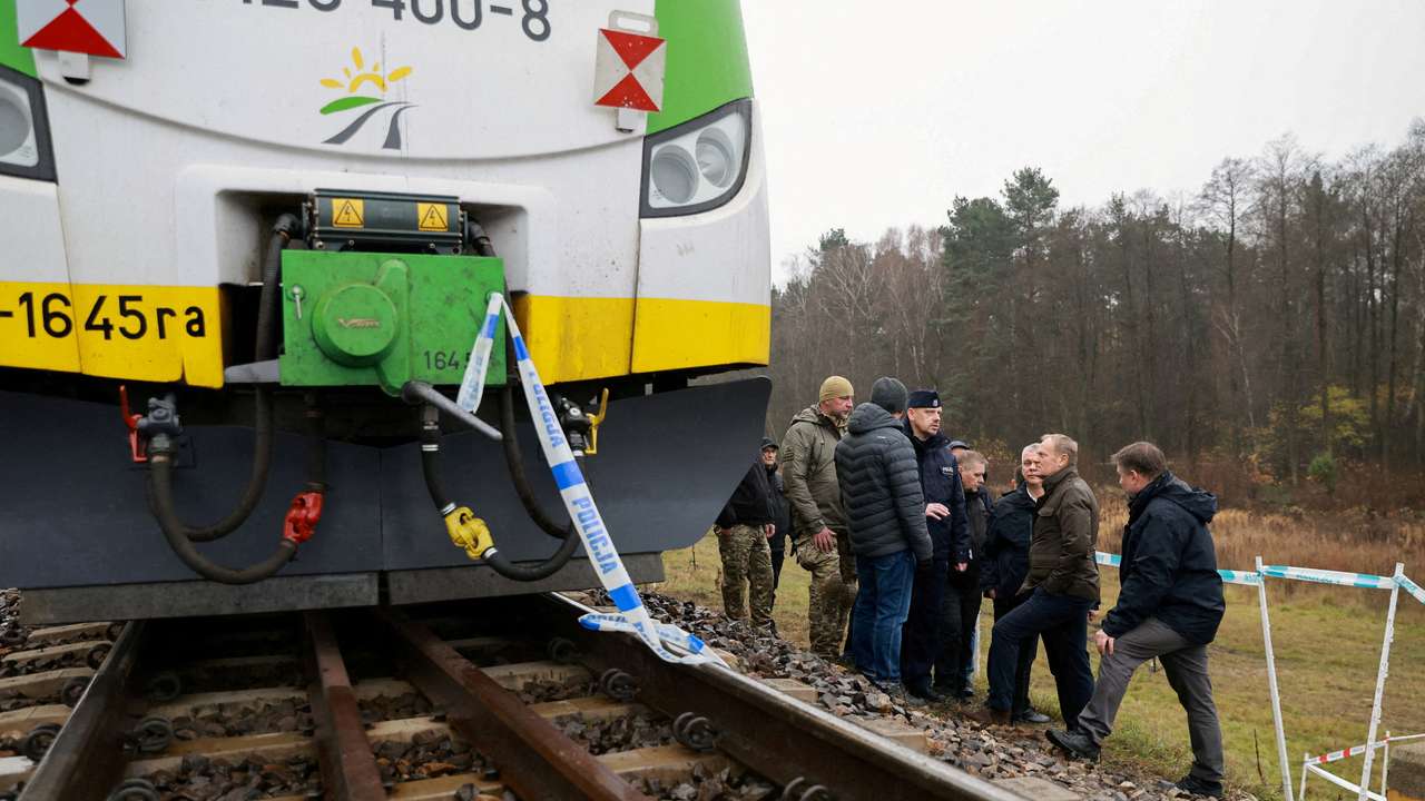 FILE PHOTO: Polish PM Tusk visits blast site on railways of Warsaw-Lublin line in Mika