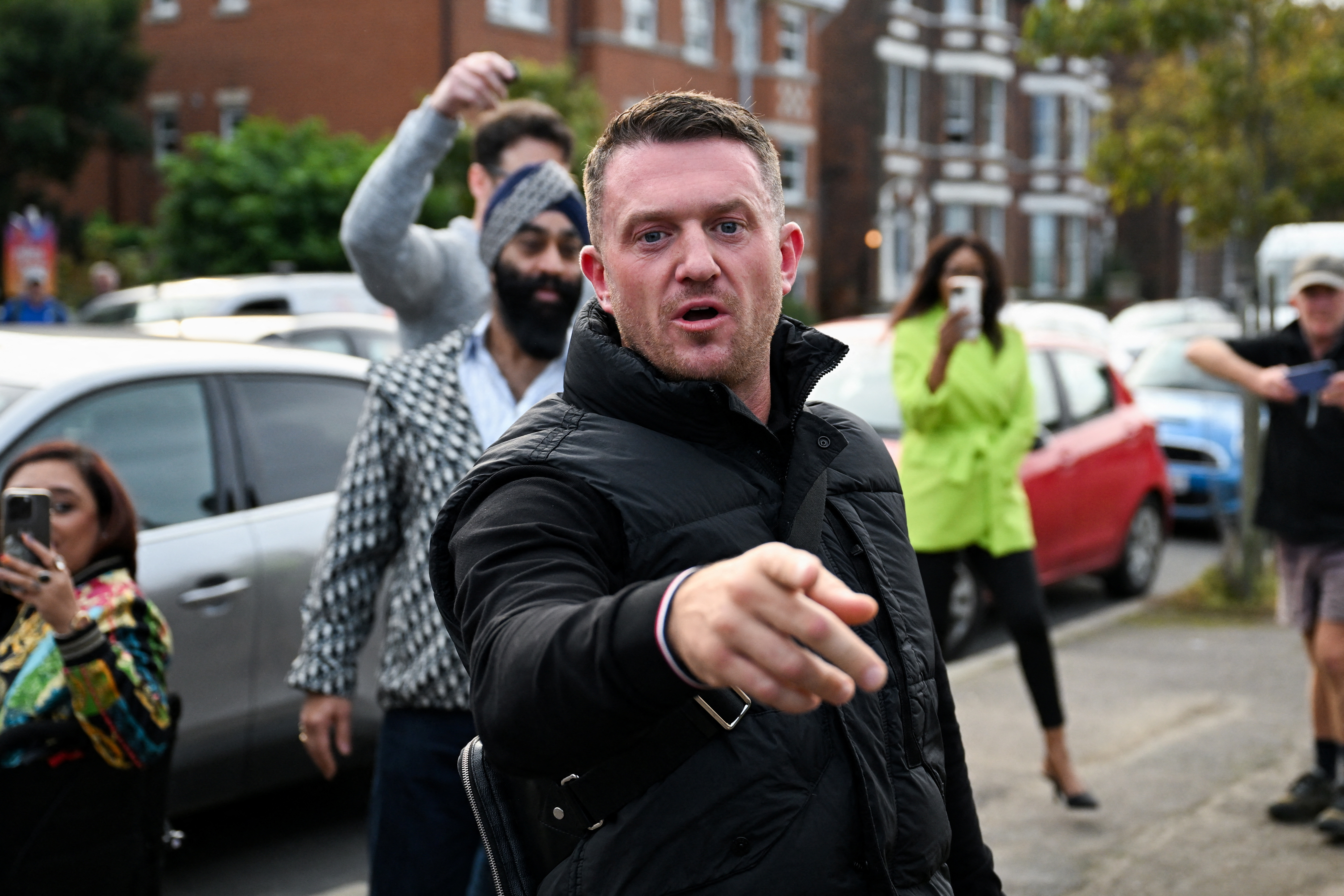 Anti-immigration activist Stephen Yaxley-Lennon, known as Tommy Robinson arrives at Folkestone Police Station