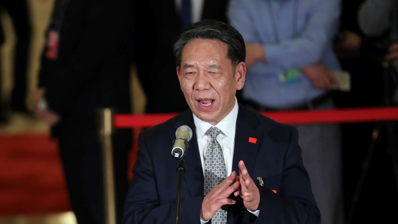 Wu Weiren, CPPCC member and chief designer of China's lunar probe program speaks to the media before the opening session of CPPCC
