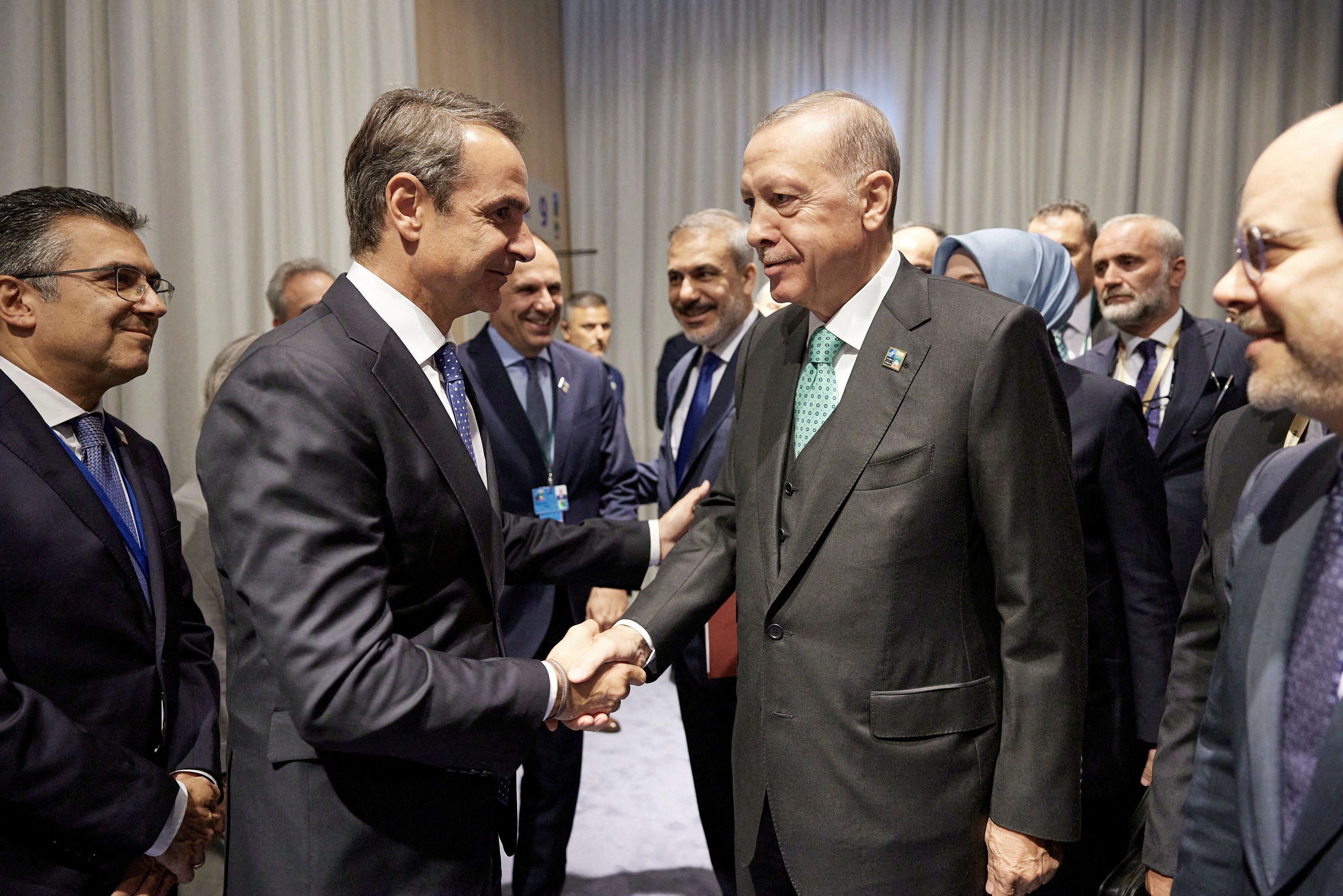 FILE PHOTO: Greece's Prime Minister Mitsotakis meets Turkey's President Erdogan during a NATO leaders summit in Vilnius