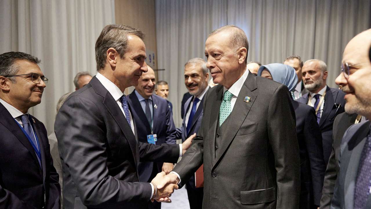 FILE PHOTO: Greece's Prime Minister Mitsotakis meets Turkey's President Erdogan during a NATO leaders summit in Vilnius