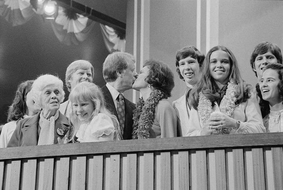 FILE PHOTO: Governor Jimmy Carter of Georgia and his wife Rosalynn kissing