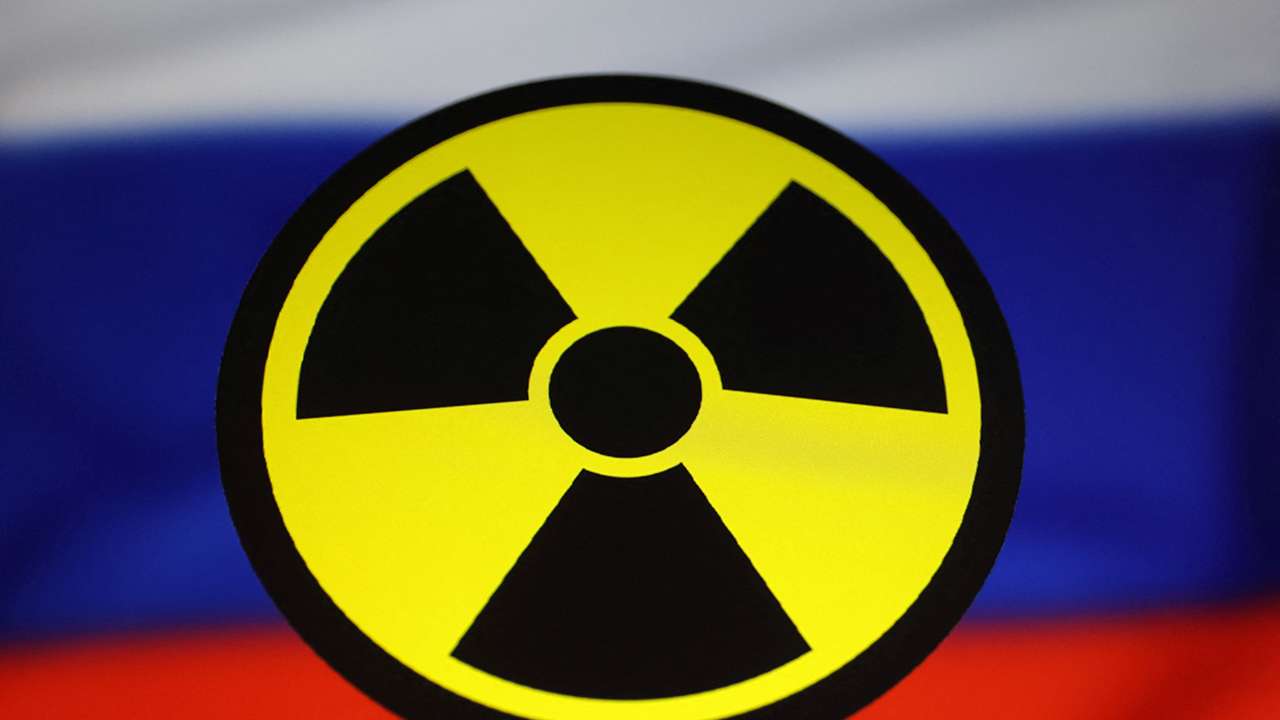 Illustration shows Russian flag and nuclear sign