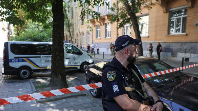 Police officer guards murder site of former Ukrainian parliamentary speaker Parubiy in Lviv