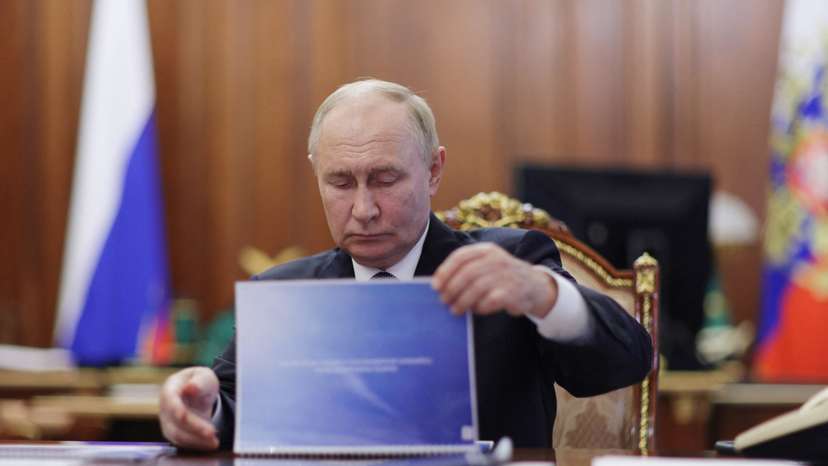 Russian President Vladimir Putin meets head of the North Ossetia–Alania region Sergei Menyailo, in Moscow
