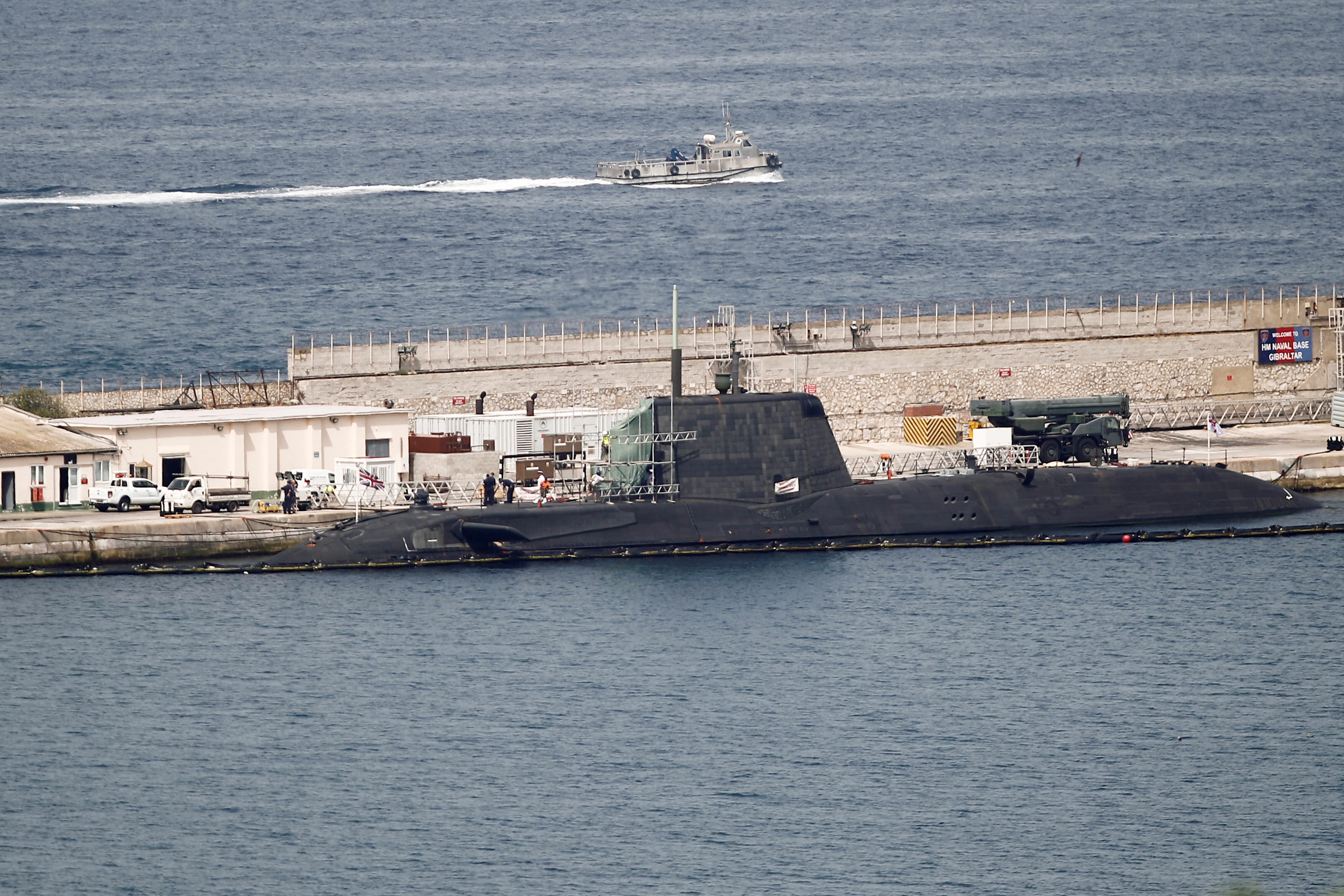 FILE PHOTO: A British nuclear Astute-class submarine HMS Ambush is seen docked in a port while it is repaired in the British overseas territory of Gibraltar