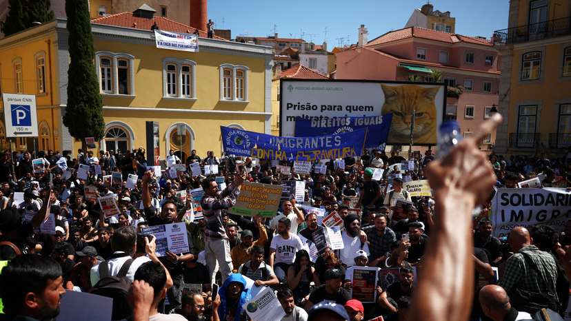 Migrants protest in front of the Portuguese parliament for rights and residency permits, in Lisbon