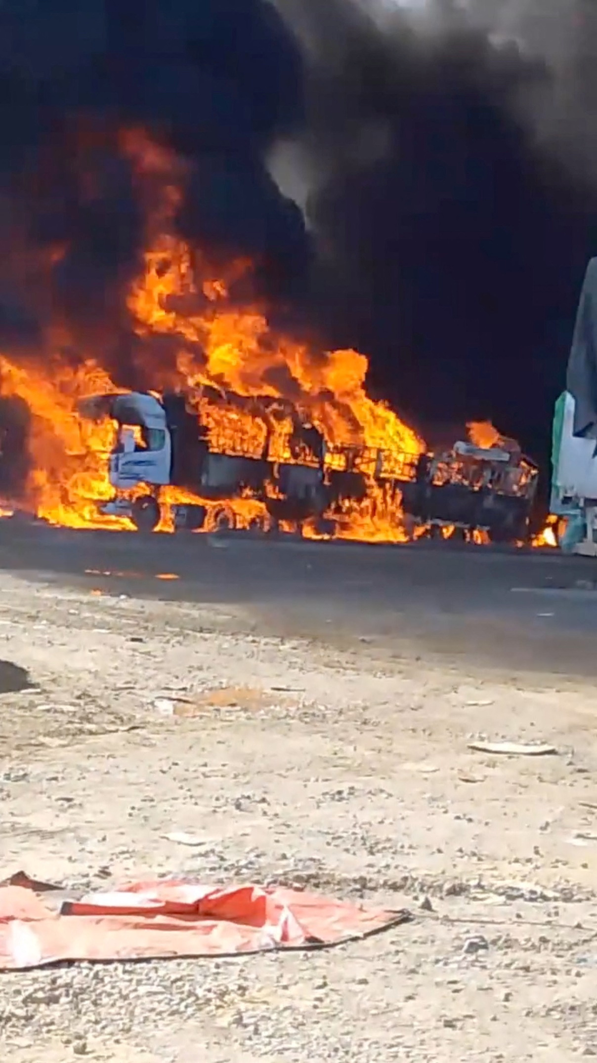 Myanmar's convoy of trucks burn on China's border, near Muse