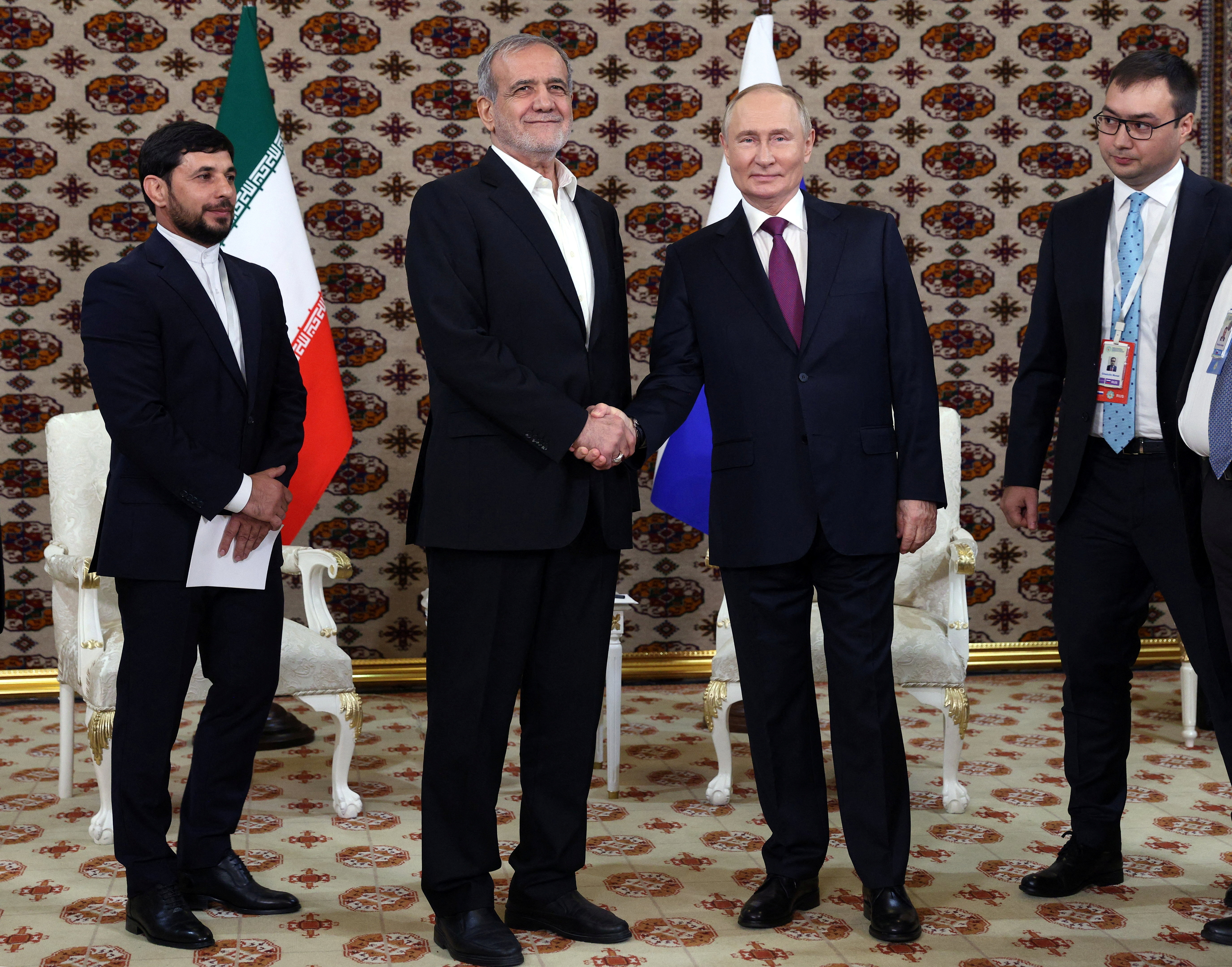 Russian President Vladimir Putin meets Iranian counterpart Masoud Pezeshkian on the sidelines of a cultural forum in Ashgabat