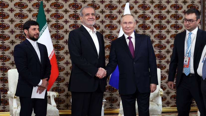 Russian President Vladimir Putin meets Iranian counterpart Masoud Pezeshkian on the sidelines of a cultural forum in Ashgabat