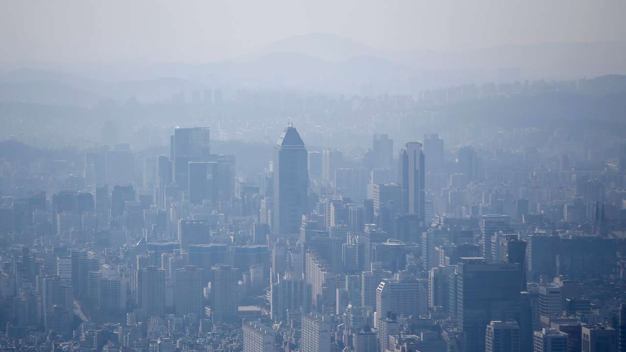 The skyline of central Seoul is seen during a foggy day in Seoul