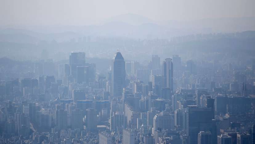 The skyline of central Seoul is seen during a foggy day in Seoul