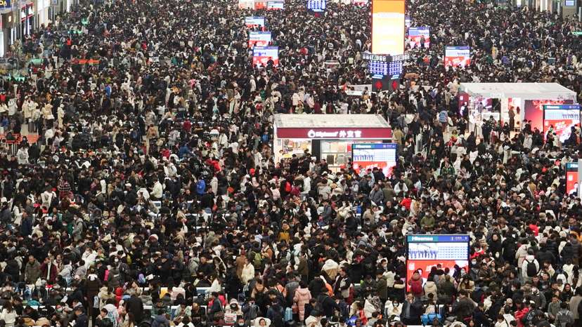 Travellers wait for their trains at Shanghai Hongqiao railway station, during the Spring Festival travel rush ahead of the Chinese Lunar New Year, in Shanghai