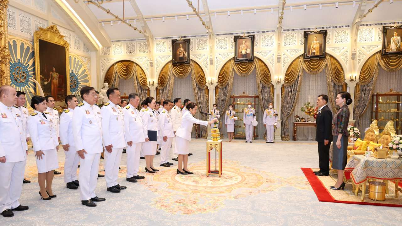 Thailand's king swears in new government after turmoil