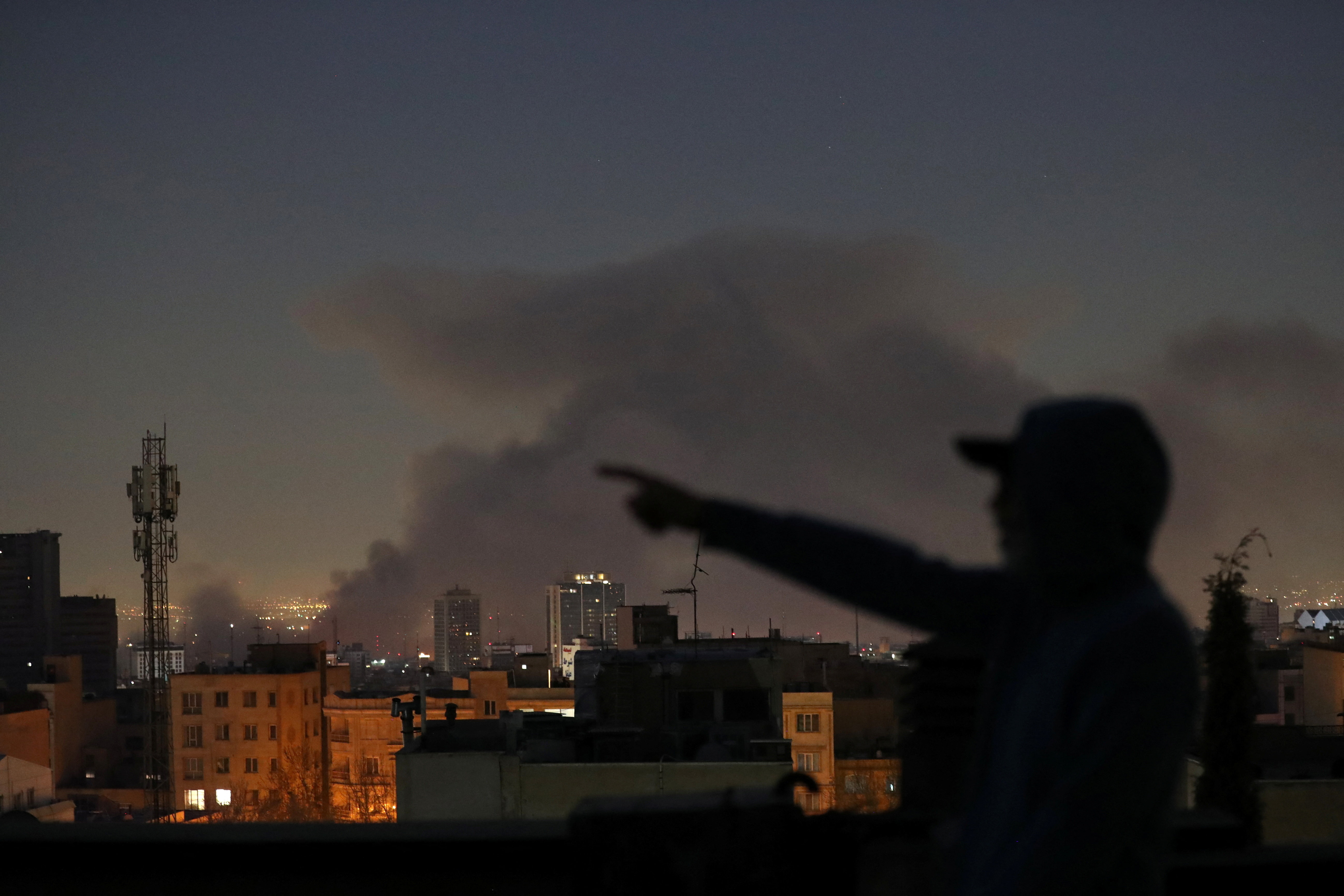 Smoke rises following an explosion, amid the U.S.-Israeli conflict with Iran, in Tehran