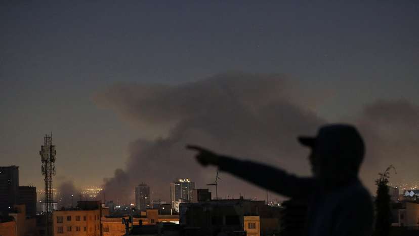 Smoke rises following an explosion, amid the U.S.-Israeli conflict with Iran, in Tehran