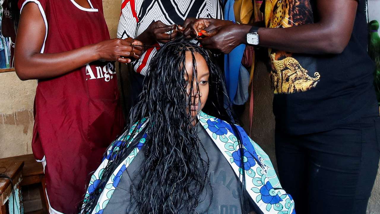 App boosts Kenyan hair braiders left behind by digital gender gap in Nairobi