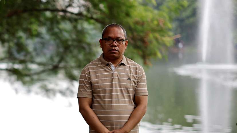 Indigenous people's rights activist Michael Chakma poses for a photograph at a park in Dhaka