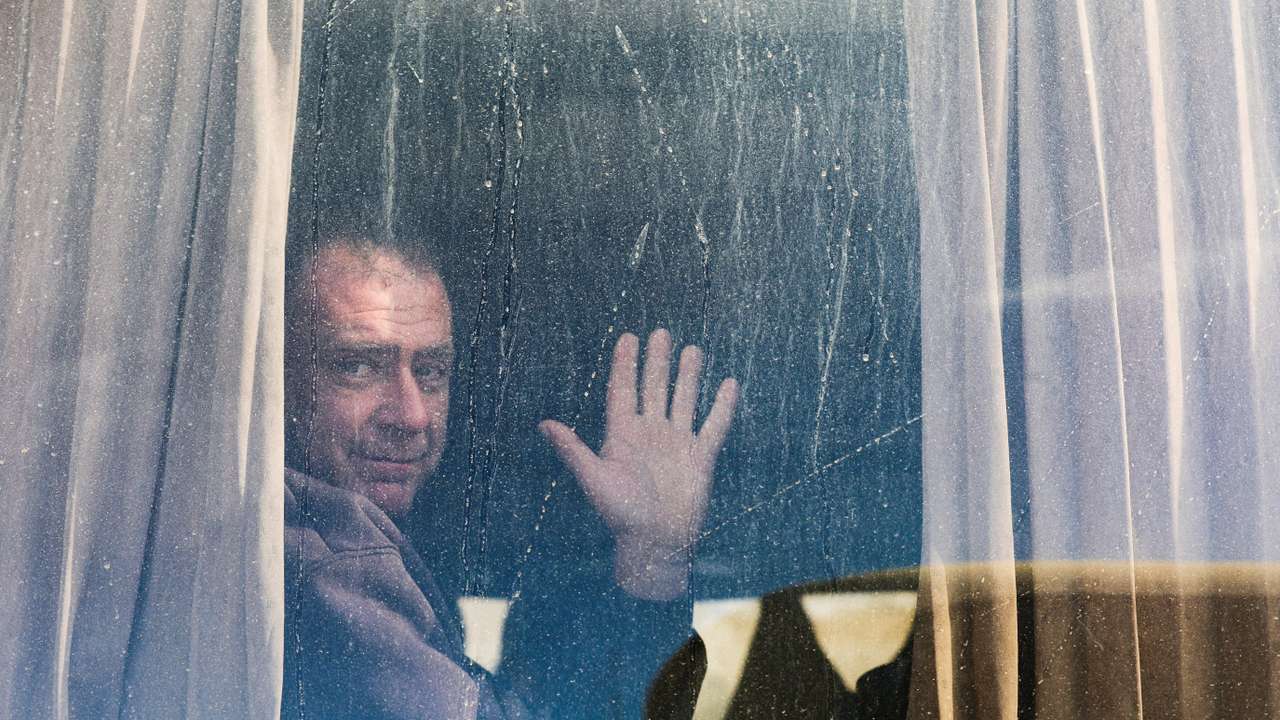 Patients and war-wounded Palestinians wait to leave Gaza for treatment abroad through the Rafah border crossing, in Khan Younis