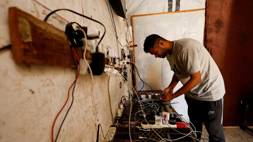 Gazans live in the dark post-sunset as power grid lies in ruins in Nuseirat