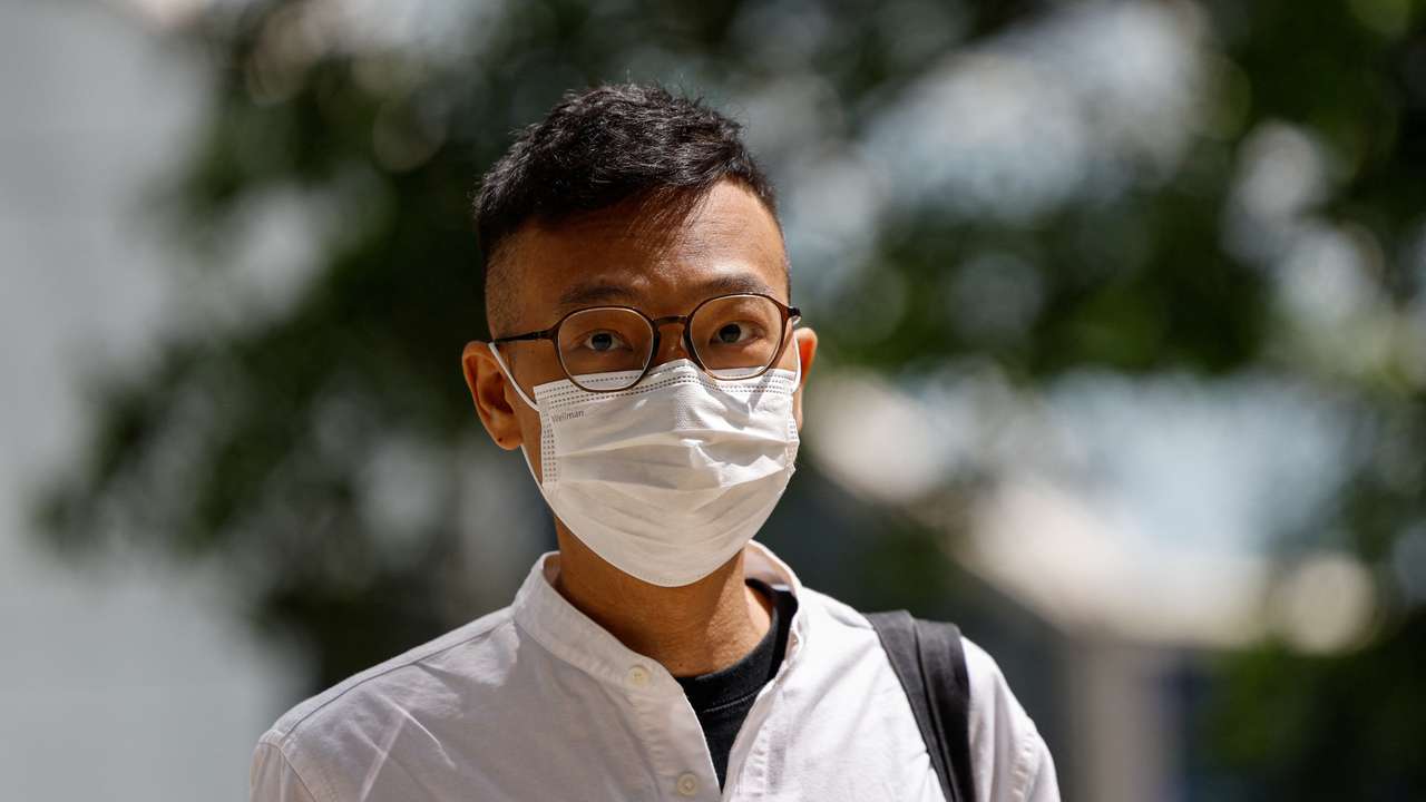 Patrick Lam, former acting chief editor of the Stand News, arrives at the District Court in Hong Kong