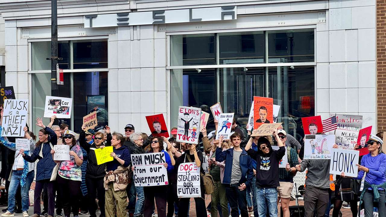 Protest against Elon Musk outside a Tesla dealership in Washington
